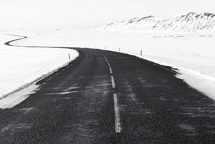 Scary and at the same nice looking foggy road in alps