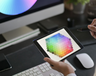 Person trying to pick the colour for the design